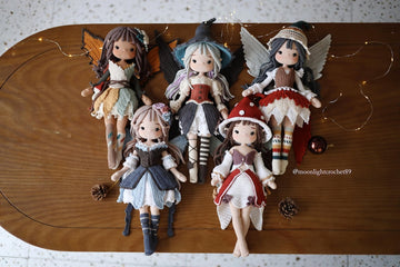Five handmade crochet fairy dolls with detailed outfits and wings